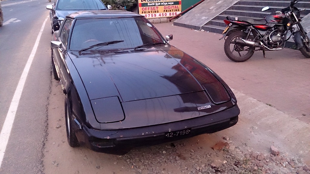 Needs new bumpers and the roof (home made sunroof included) is totally botched.