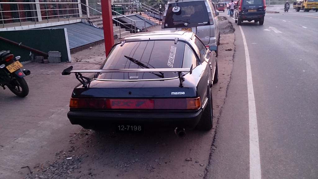 What do you make of that rear end? The lamps has a locally fabricated look yet neatly fits in the space, or so I imagine?