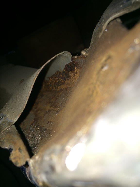 This is what I am talking about. This is the bottom of the A pillar panel that runs under the cowel panel.