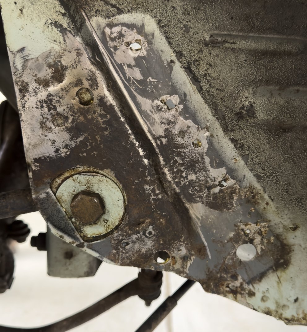 O/s after surface rust removal, hole at 4o'clock from bolt head